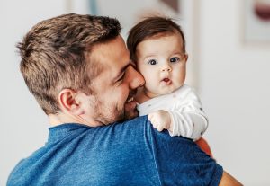 dad holding his baby